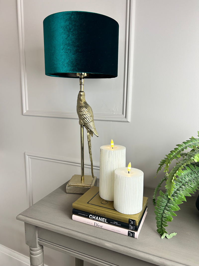 Gold parrot lamp with emerald green shade