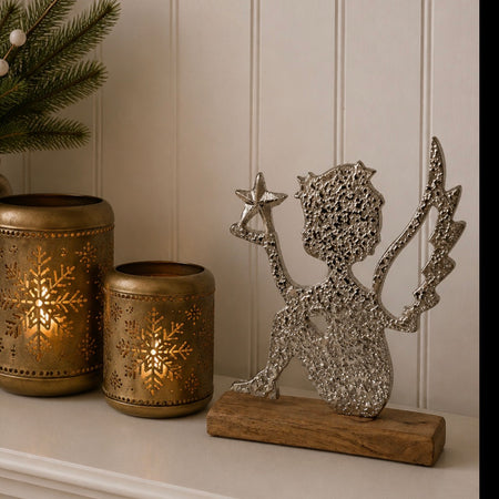 Metal large angel on wood plinth stand