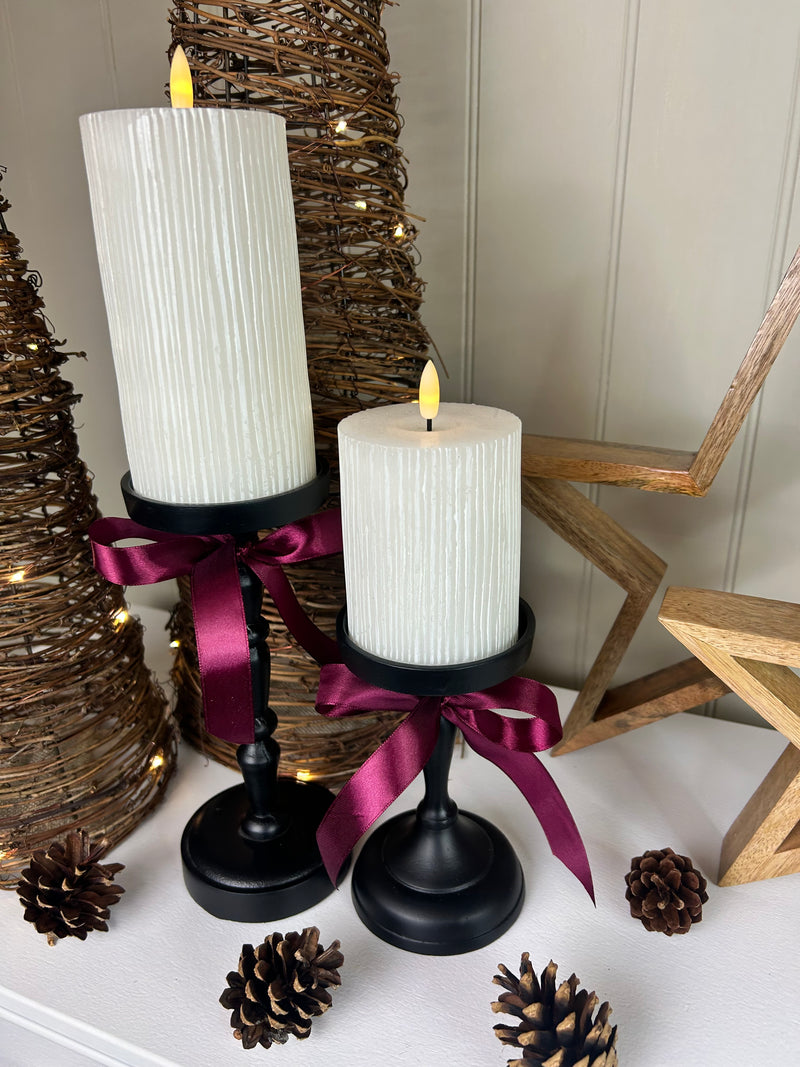 Set of Two Tall staggered height Black Metal Candlesticks 23cm