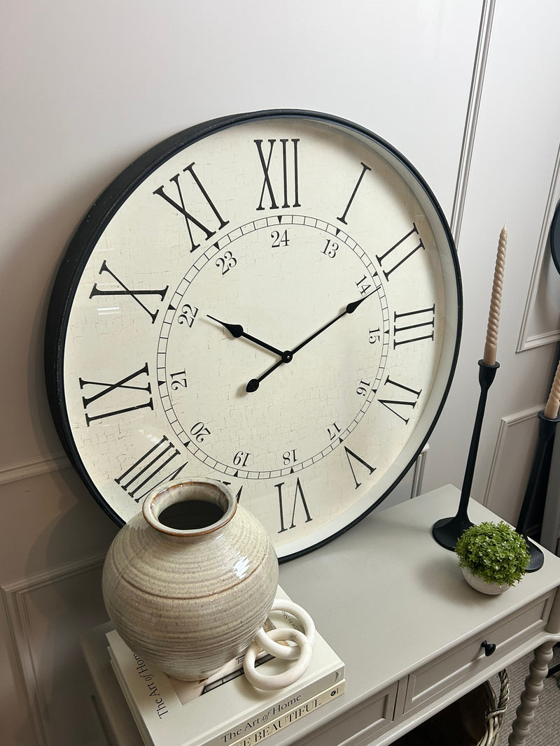 Black wooden based metal clock