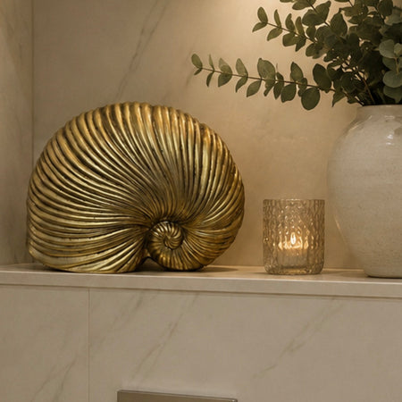 Gold sea snail shell ornament