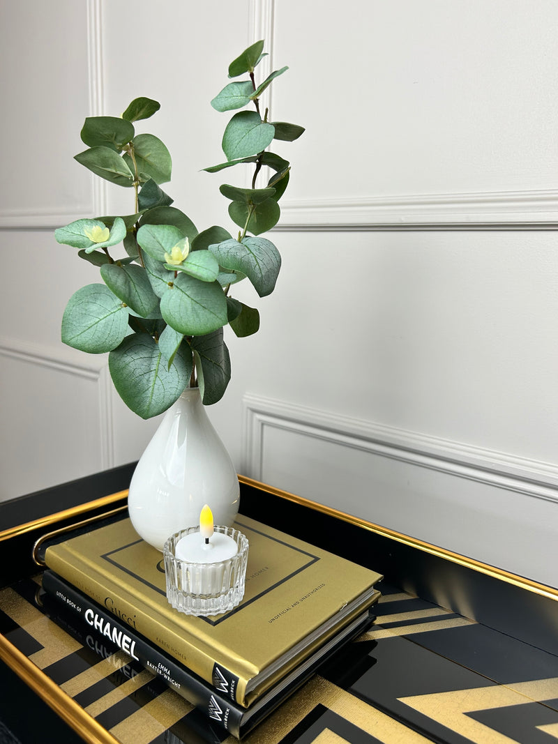 White vase with eucalyptus