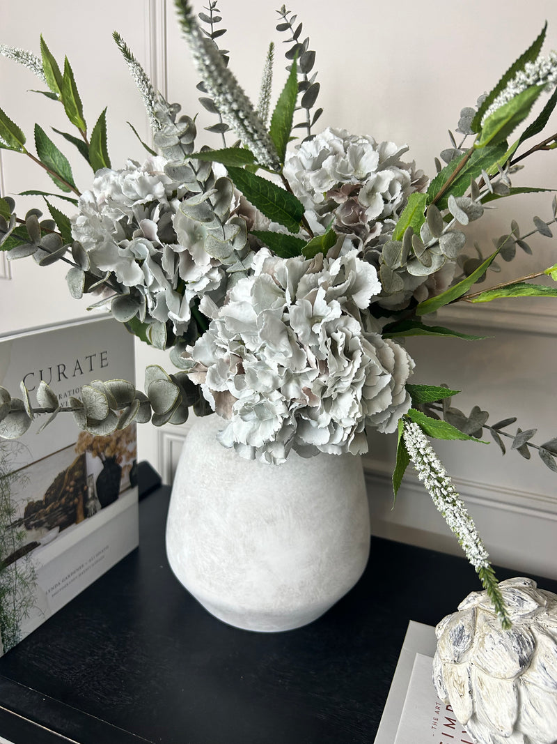 Bouquet arrangement grey/taupe hydrangeas white Veronica eucalyptus bunch.