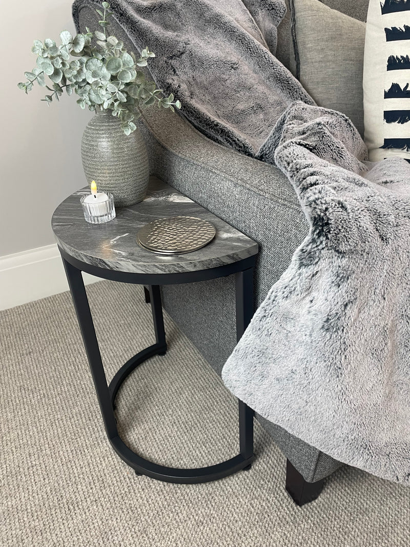 Black marble look top half moon table