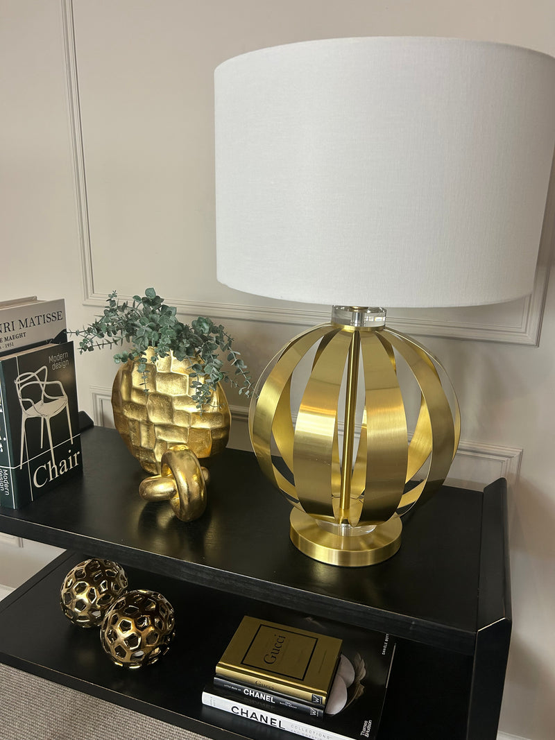 Gold metal round chunky lamp with white shade