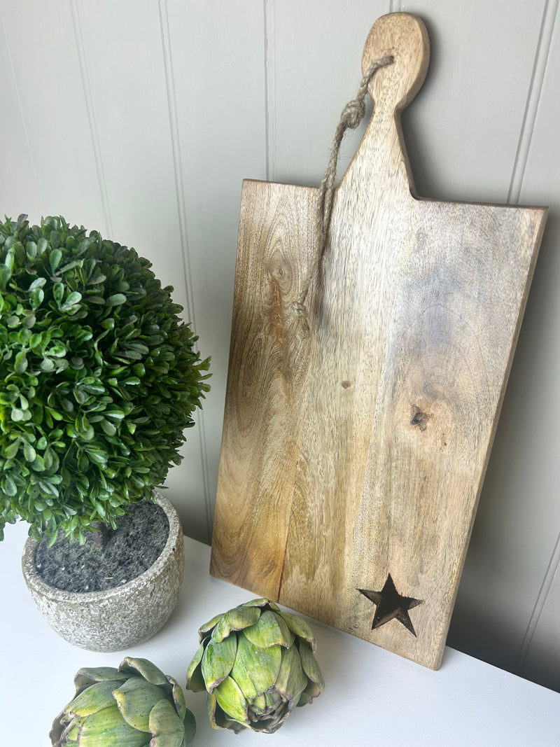 Star detail mango wood chopping board rustic