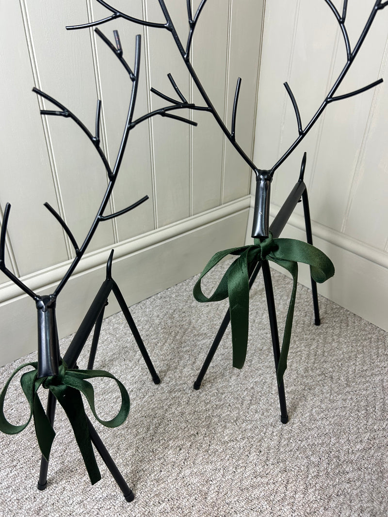 Set of two black metal reindeers 67cm