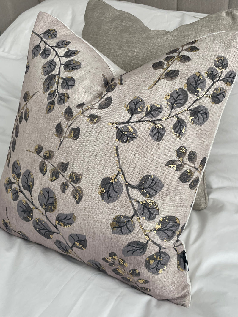Gold leaf detail luxe cushion