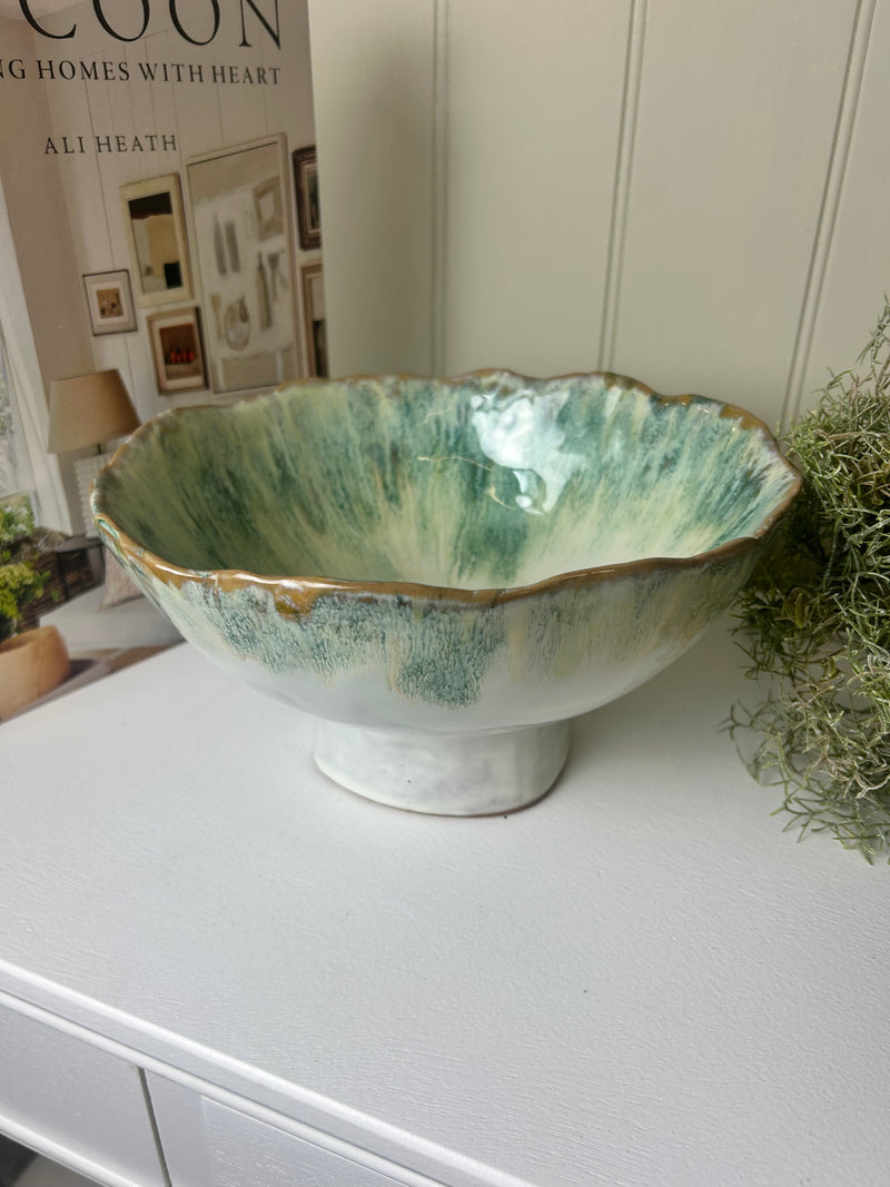 Green decorative ombré bowl on foot stand