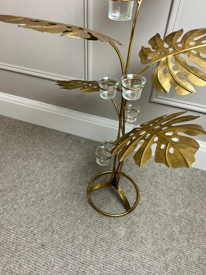 Tall gold leaf candle holder