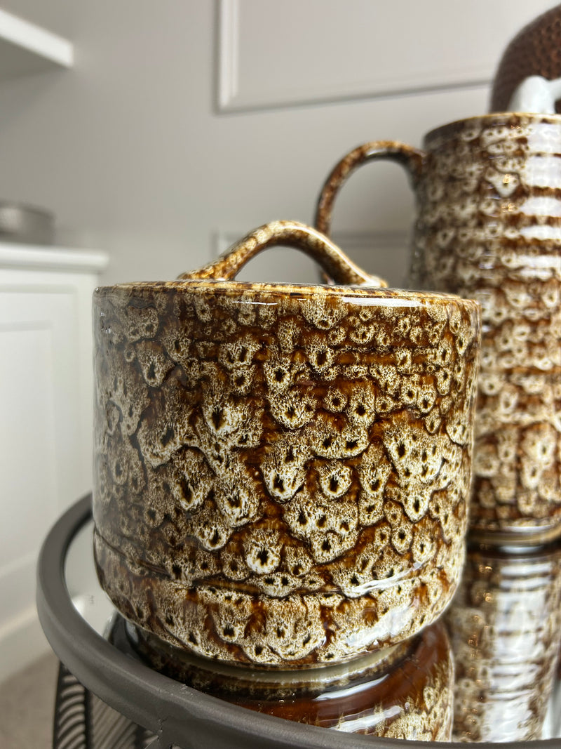Chunky mottled brown ceramic lidded jar