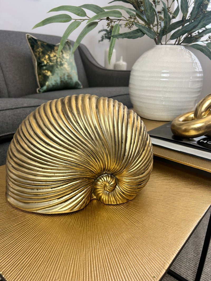 Gold sea snail shell ornament