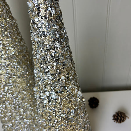 Set of two tall sequin gold cone trees