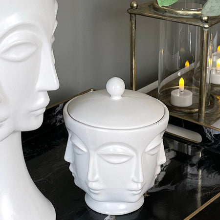White faces ceramic lidded jar