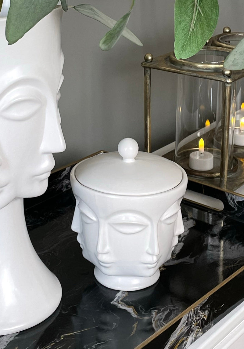 White faces ceramic lidded jar