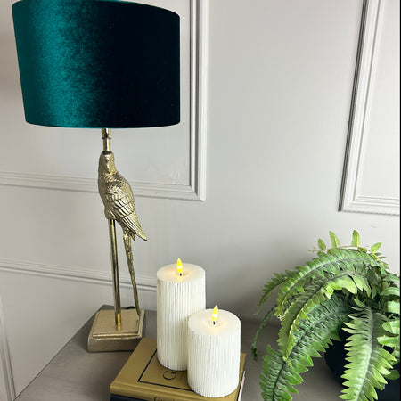 Gold parrot lamp with emerald green shade