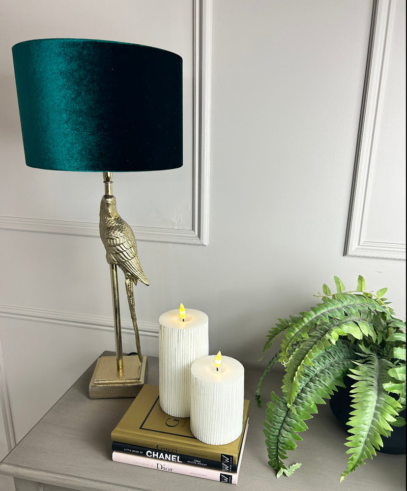 Gold parrot lamp with emerald green shade