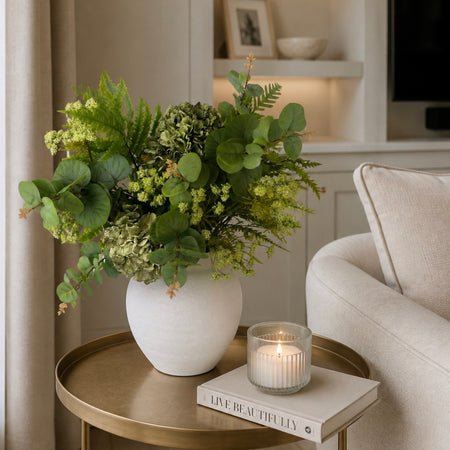 Lush green hydrangea eucalyptus fern cow parsley arrangement