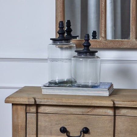 Glass jar with finial black lid