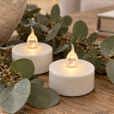 Single white tea light candle