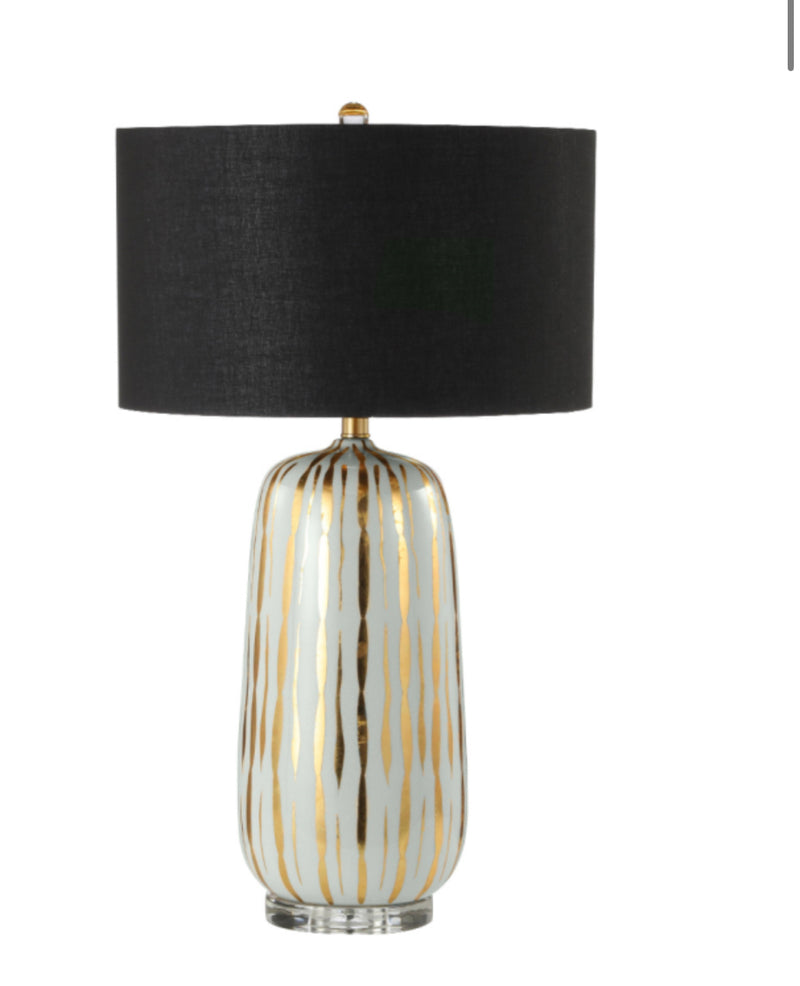 Gold and white ceramic lamp with black shade