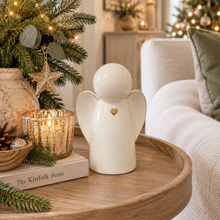 Large white and gold angel