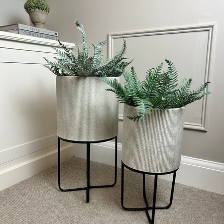 Ribbed White floor standing Metal Planter on black stand