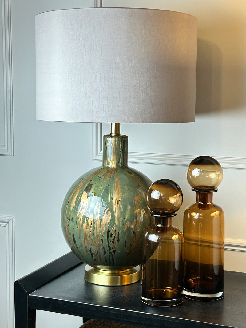 Gold and white ceramic lamp with black shade