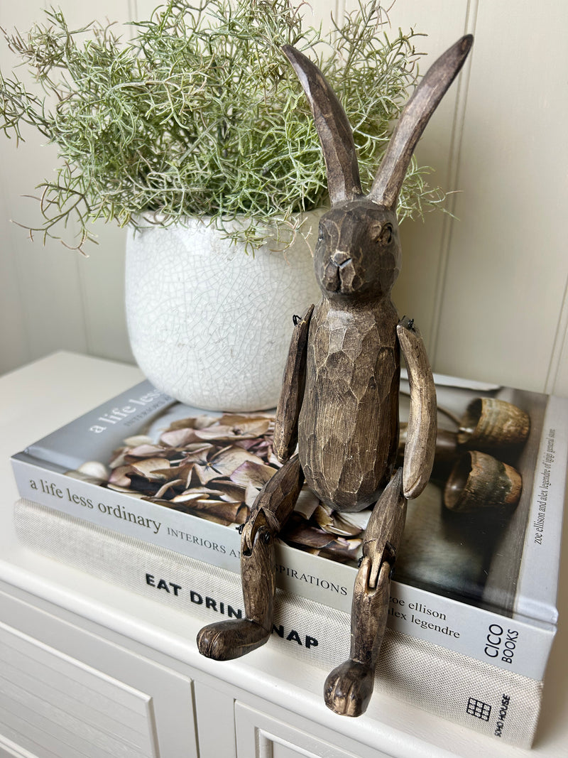 Brown jointed rabbit shelf sitter