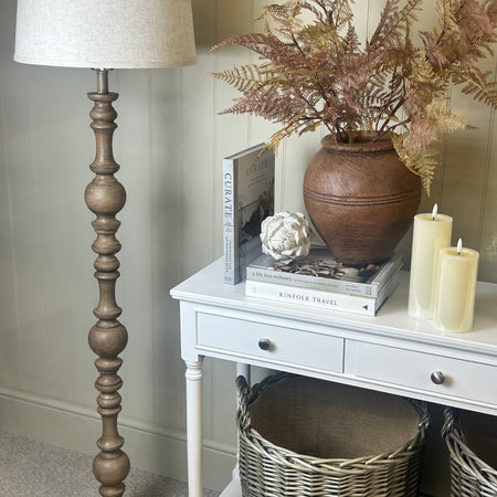 Wooden shaped floor lamp with linen shade