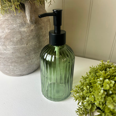 Green soap dispenser