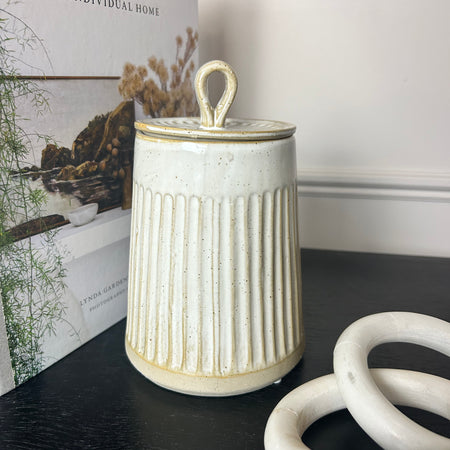 Cream white ridged lidded jar