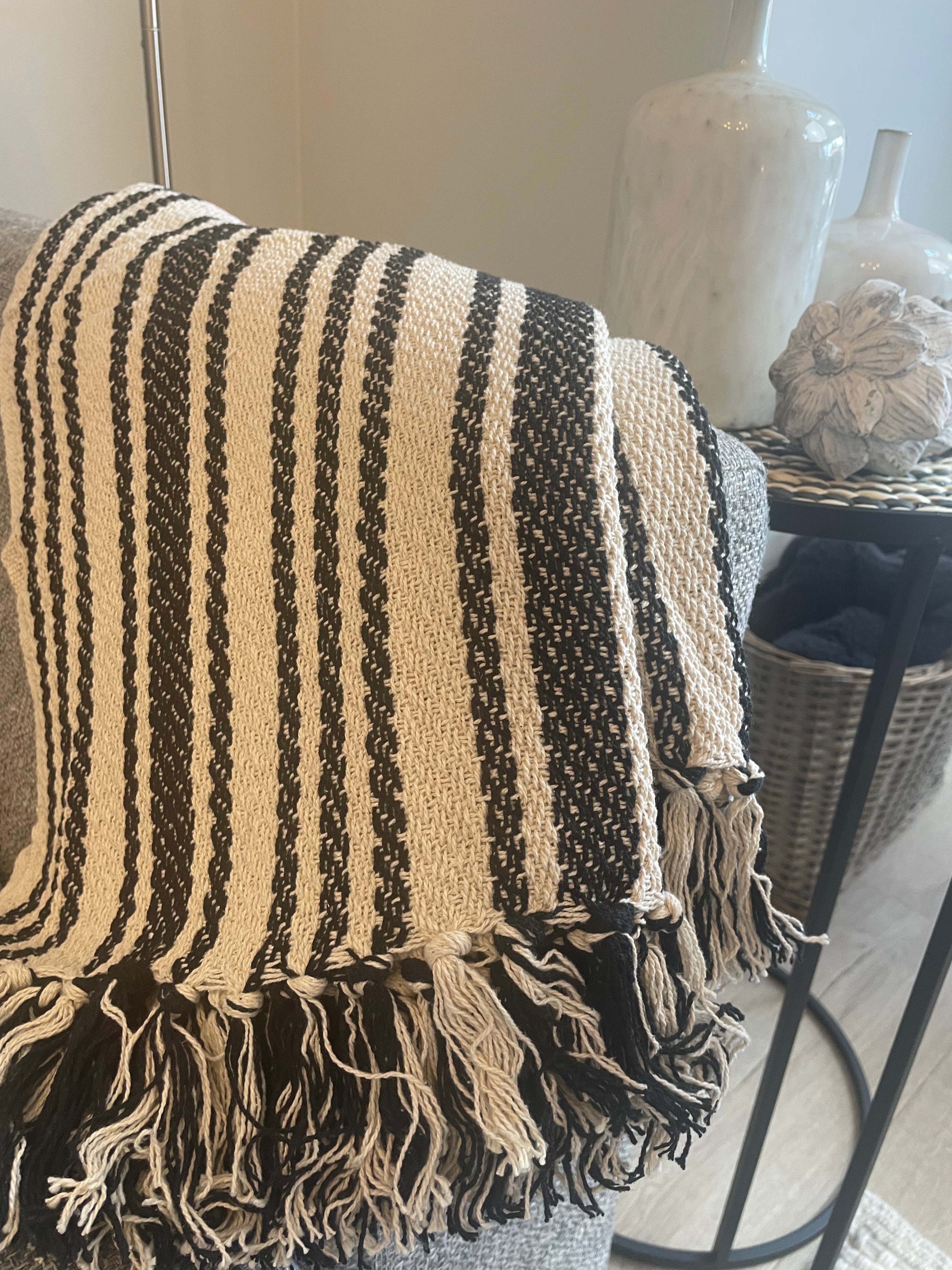 Ivory and black stripe weaved pattern throw Abode