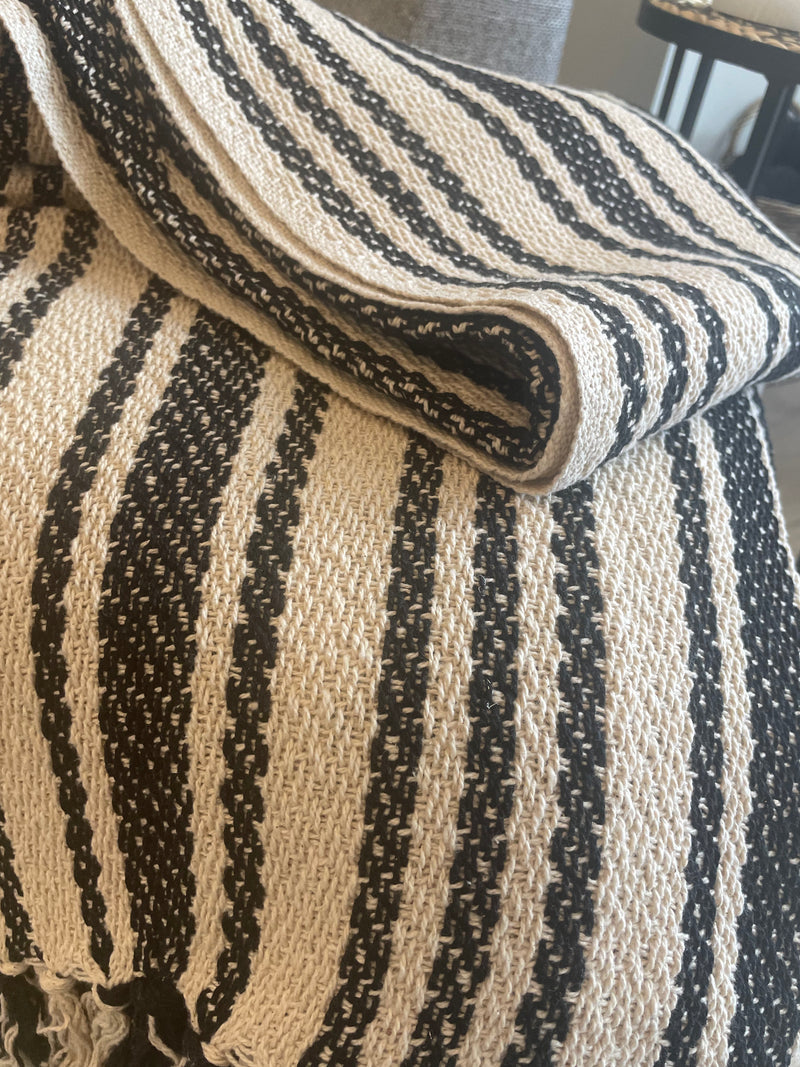 Ivory and black stripe weaved pattern throw