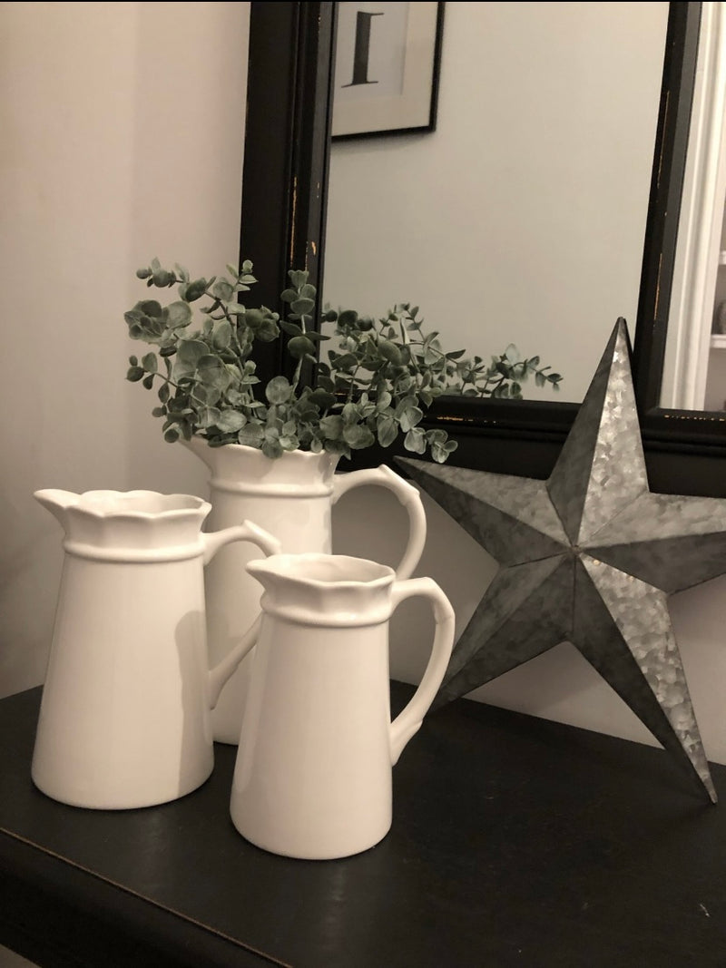 Grey ceramic vase with white star