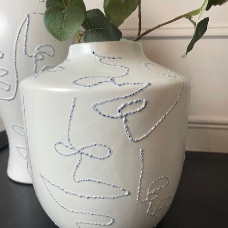 Medium white faded faces vase