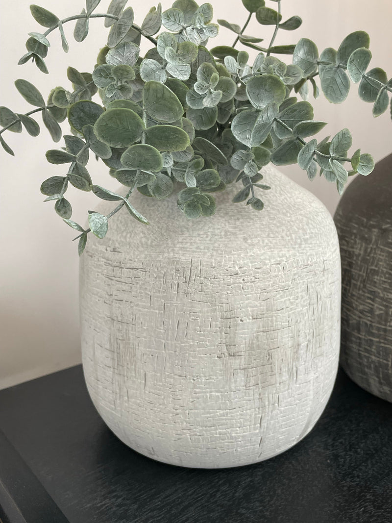 Off white bulbous round ribbed textured vase