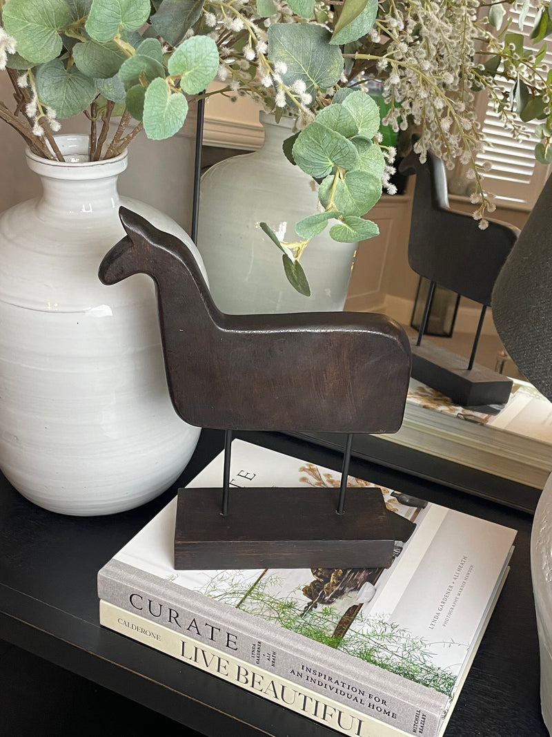 Wooden hand carved horse on stand