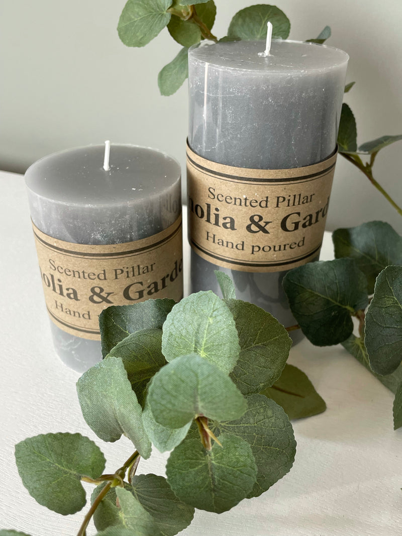 Small scented pale grey pillar candle 10x7cm