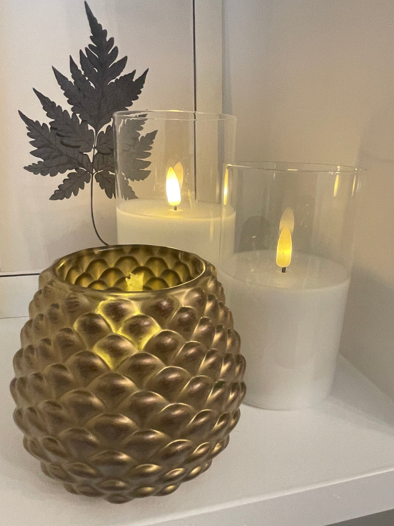 Gold heavy pine candle holder