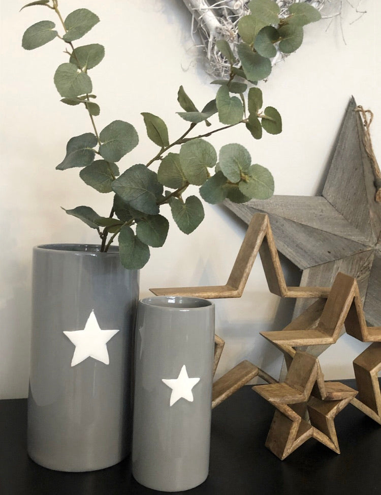Black and gold glass lamp with taupe shade