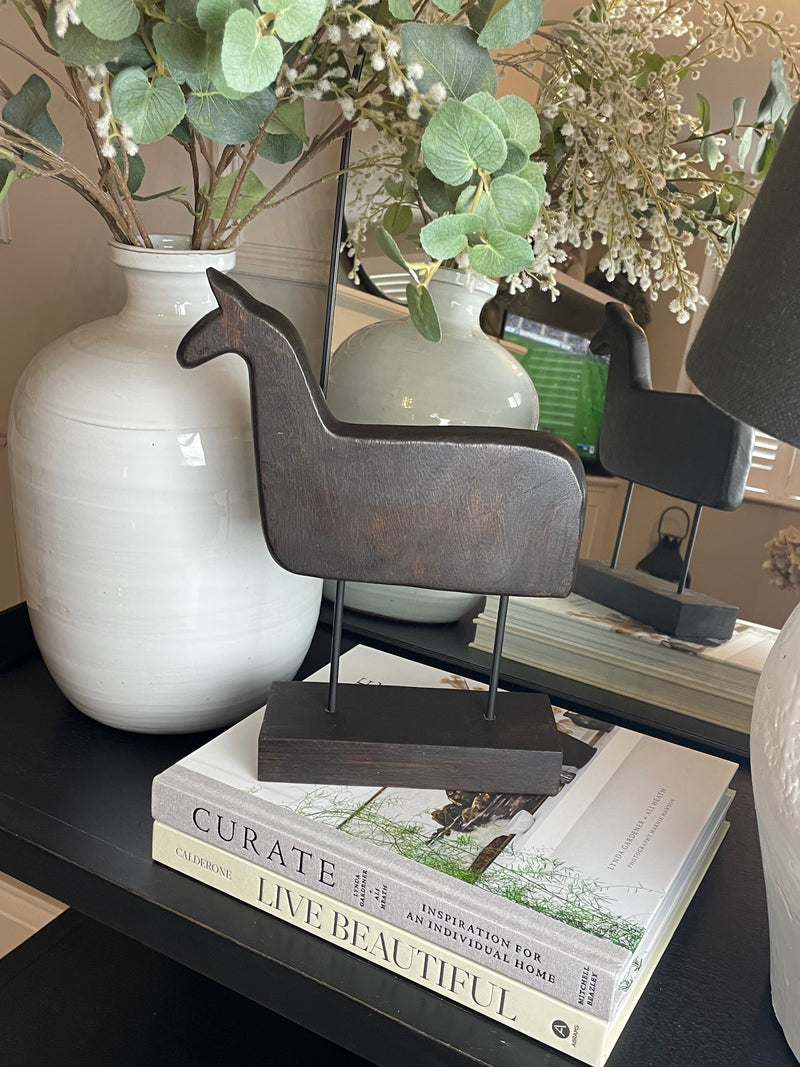 Wooden hand carved horse on stand