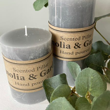 Small scented pale grey pillar candle 10x7cm