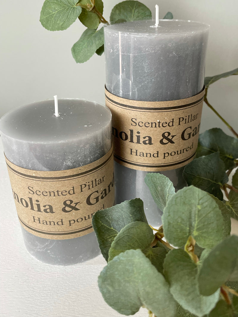 Small scented pale grey pillar candle 10x7cm