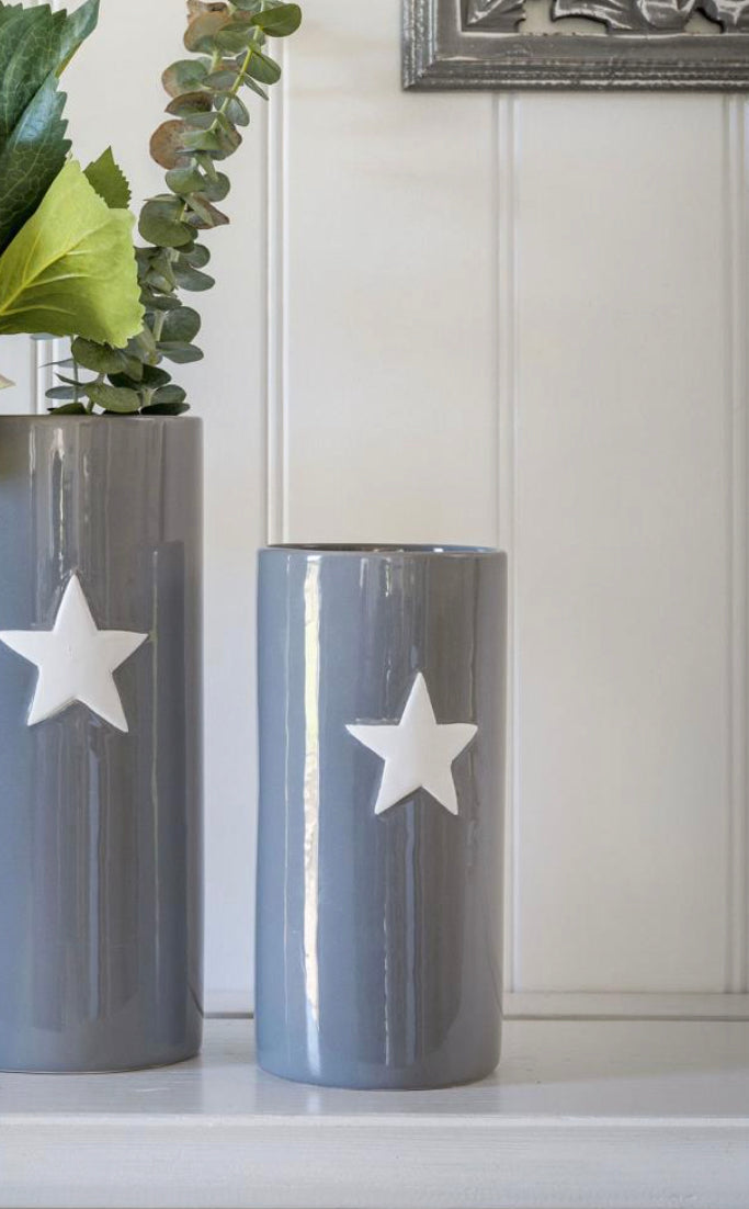 Grey ceramic vase with white star