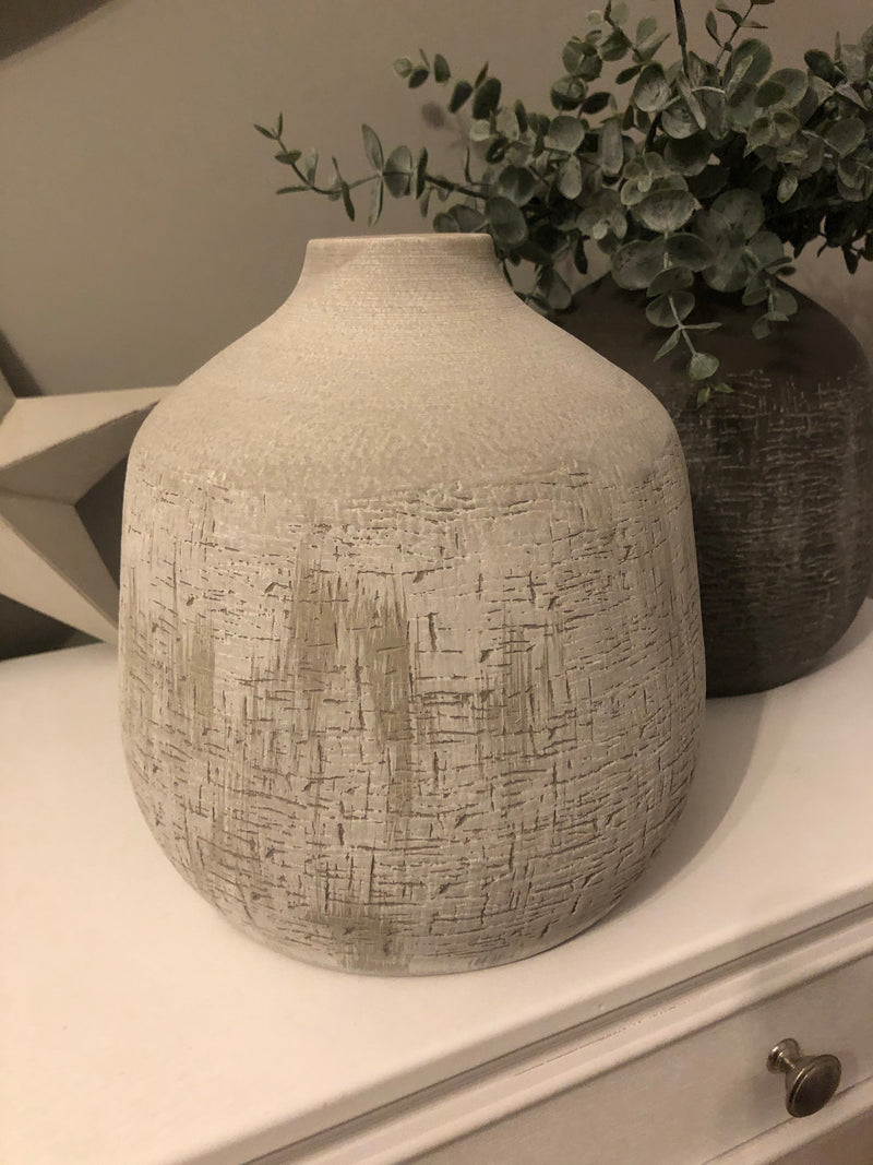 Off white bulbous round ribbed textured vase