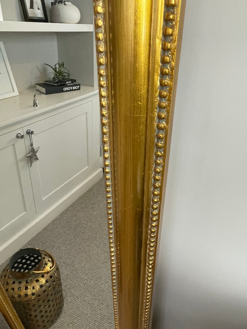 Gold beaded arched full length mirror