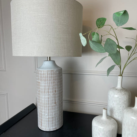 Grid pattered ceramic lamp with linen shade