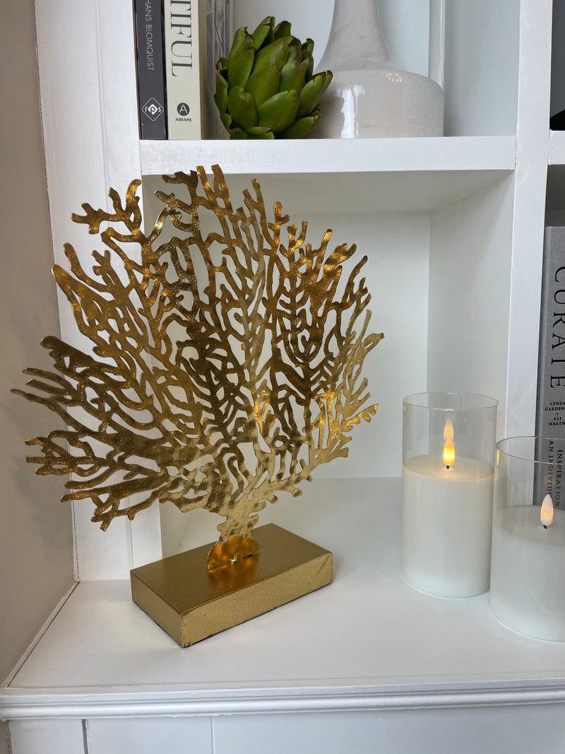 Gold coral decoration on stand