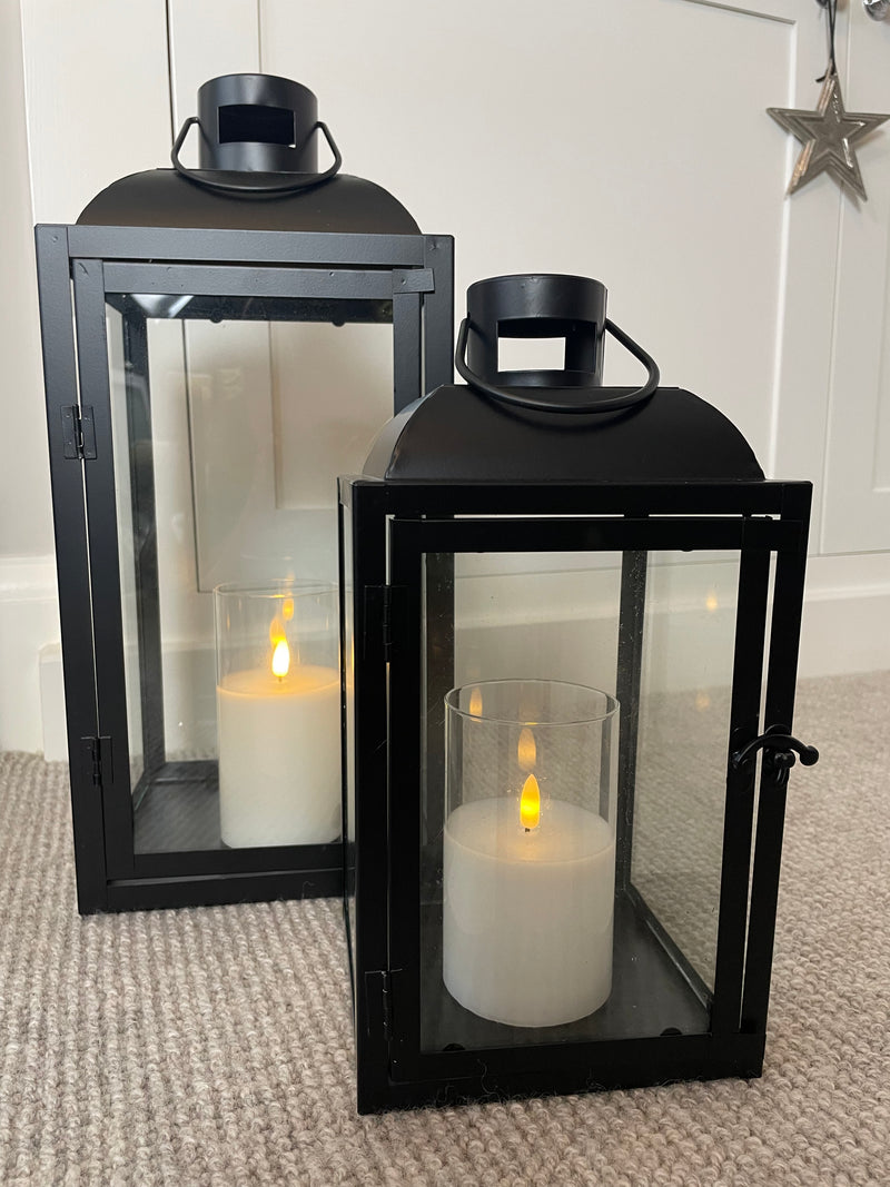 Set of two black metal lanterns